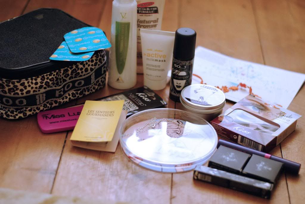  photo London bloggers party goodie bag, beauty, Palmers cocoa butter, tanning moisturizer, Haute Couture lashes, Rouge Bunny Rouge makeup, any which way blogger necklace, laser cut perspex jewellery